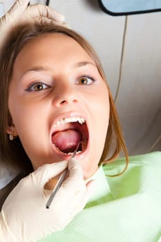 young woman patient at dentist