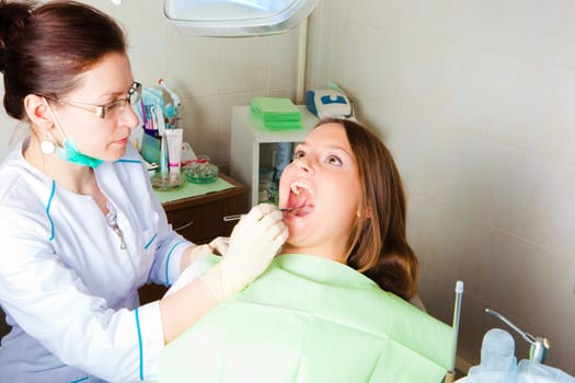 young woman patient at dentist