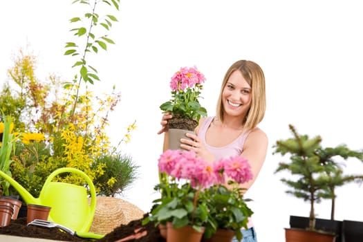 Gardening -  woman holding flower pot with flower
