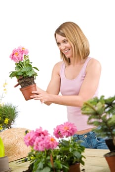 Gardening -  woman holding flower pot with flower