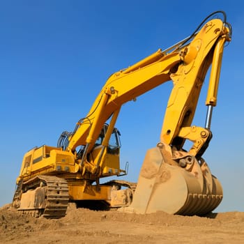 Massive excavator in front of blue sky