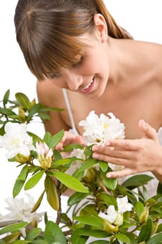 Gardening - Portrait of woman with Rhododendron