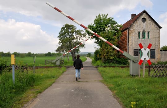 At the level crossing