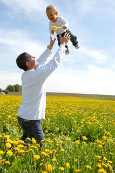 Proud Father - Holding Up Child -
