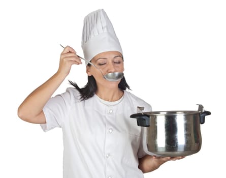 Pretty cook girl testing a meal