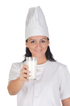 Pretty cook girl drinking milk