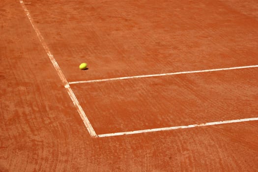 Tennis court with blurred ball