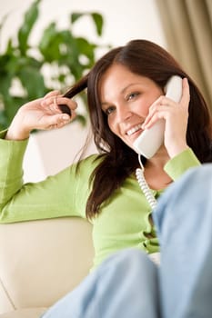 On the phone home Happy woman calling