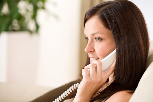 On the phone home - woman calling