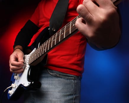 Playing electric guitar