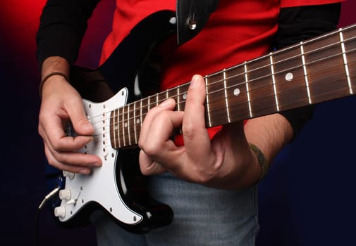 Playing electric guitar