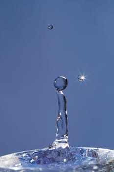 culumn of water and falling drops