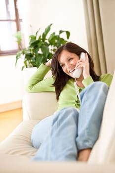 On the phone home - young woman calling