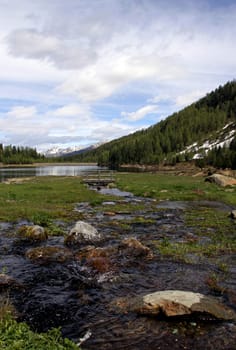 South Tyrol: Weißbrunnsee nature reserve in Val d'Ultimo near Merano The Weissbrunn reservoir is the source of the Falschauer River. This river runs through the Val d'Ultimo and flows into the Adige River near Lana.
