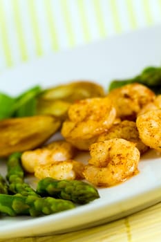 Prawns with baked potatoes,and green