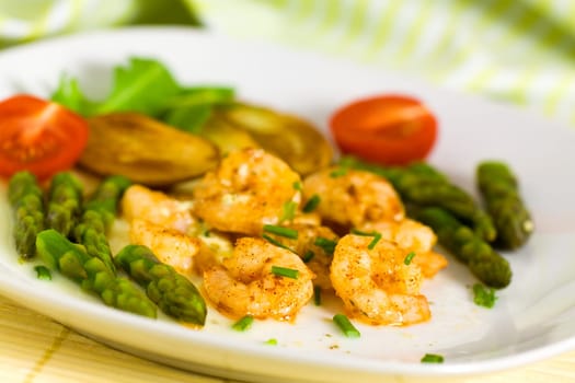 Prawns with baked potatoes,and green