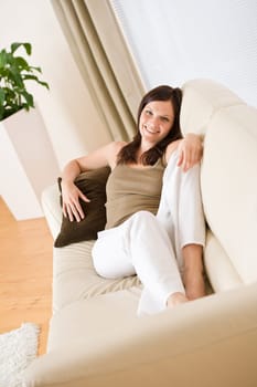Young woman relax lying down in lounge