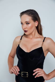 portrait of woman in black clothes with a serious look