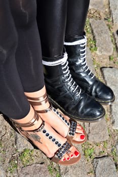 Feet in sandals and boots