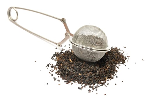 Black tea blend in tea tongs
