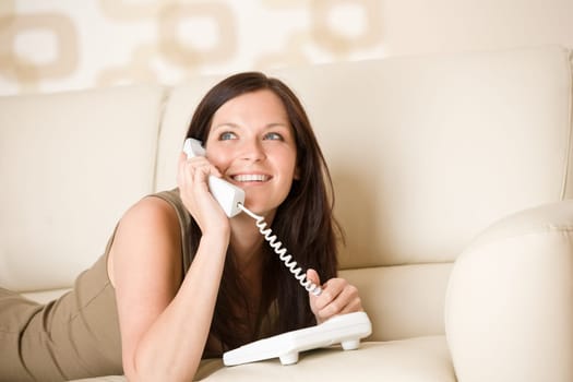 On the phone home - young woman calling