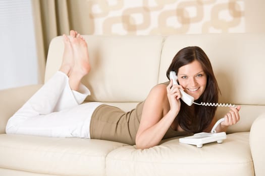 On the phone home - young woman calling