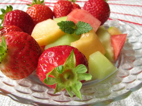 Fruit platter with strawberries and melon