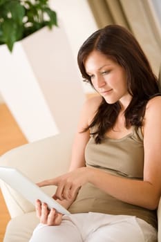 Woman with touch screen tablet computer