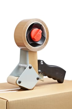 Packaging tape dispenser and shipping box