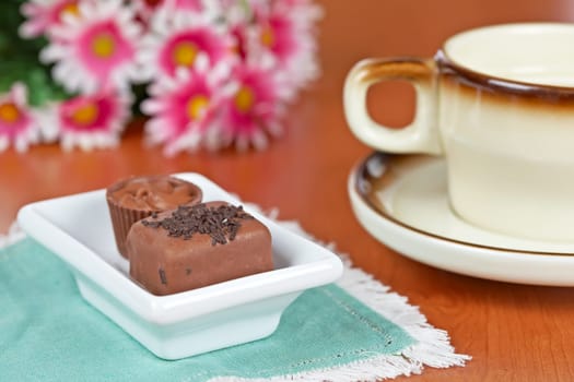Coffee with chocolate candies