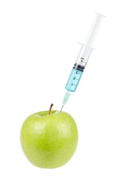 Green apple with syringe inserted