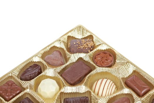 Chocolate candies in a gold box