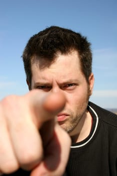 Man pointing finger at viewer
