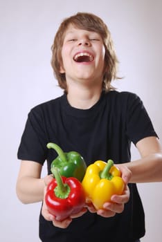 Boy with bell pepper