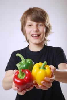Boy with bell pepper