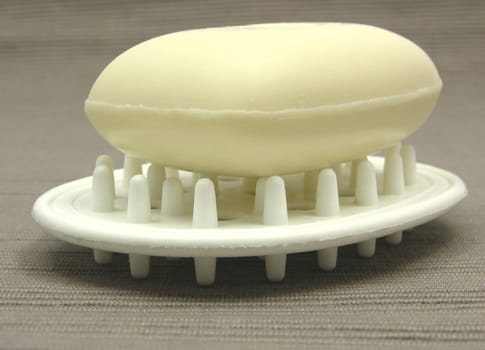 Beige soap on soap tray