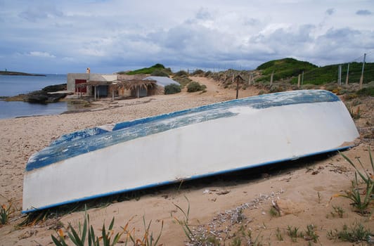 old boat on the natural beach