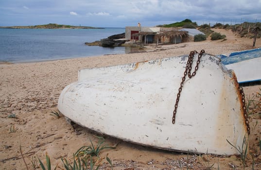 old boat on the natural beach