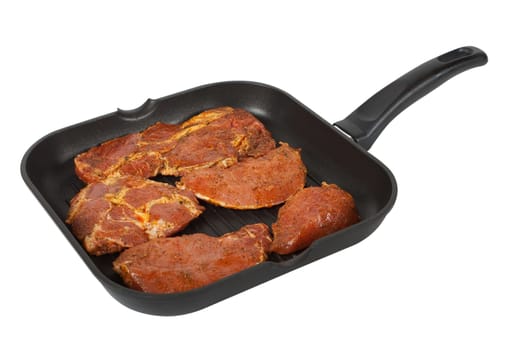 Pan with meat for grilling
