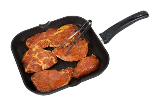 Pan with meat for grilling