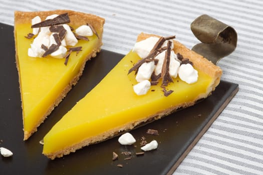 Two slices of orange pie