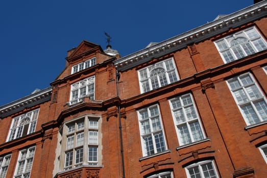 Red façade and white windows