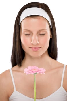 Beautiful woman holding gerbera daisy flower