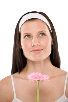 Beautiful woman holding gerbera daisy flower