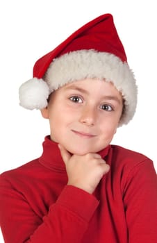 Adorable boy with santa hat thinking