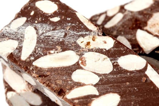 Close up of chocolate almond nougat