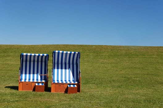 two blue beach chairs