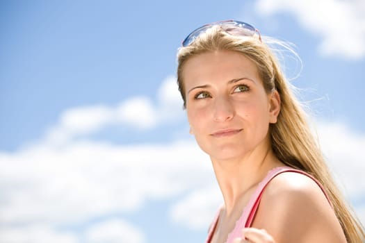 Blond woman enjoy summer sun