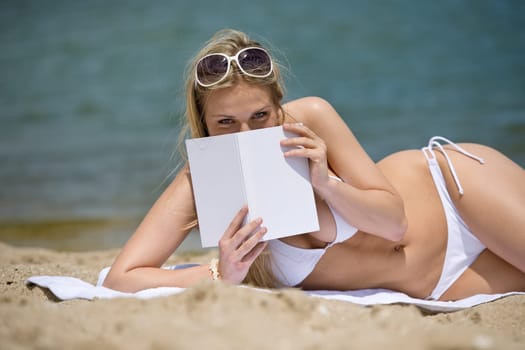 Blond woman enjoy summer sun