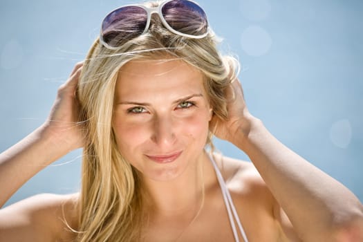 Blond woman enjoy summer sun